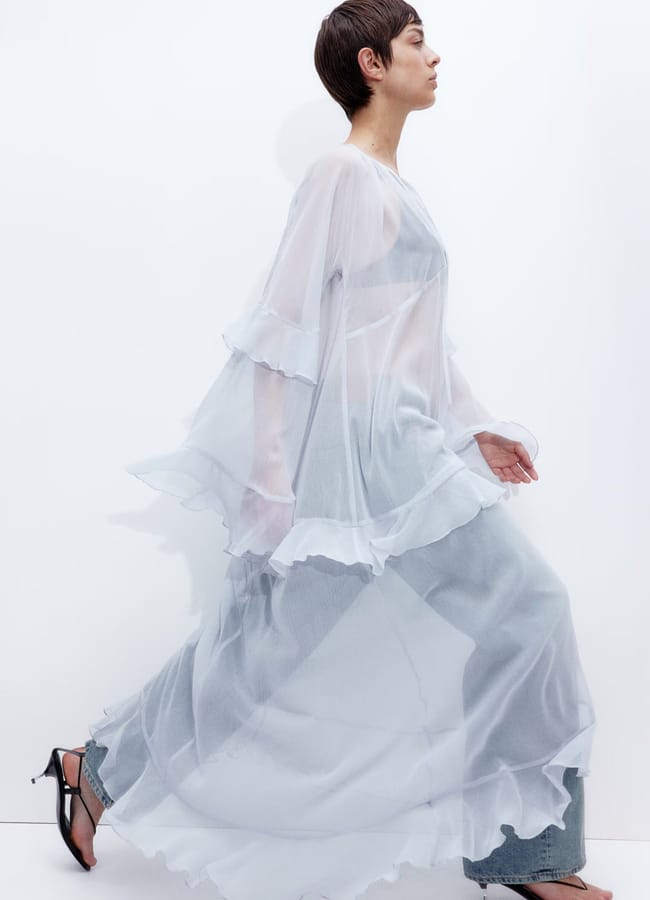 model wearing pale blue H&m Flounced chiffon dress