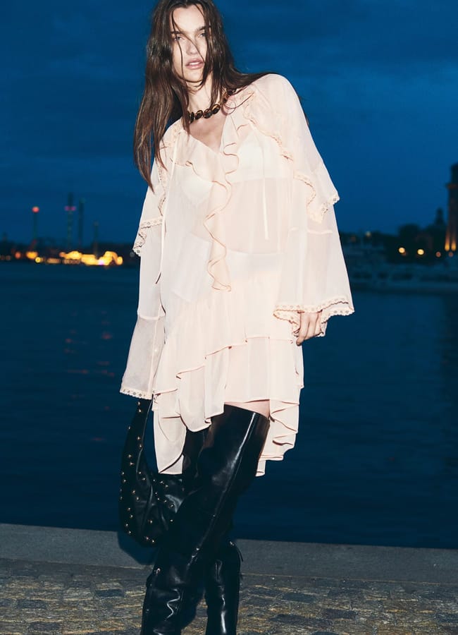 model on beach at night wearing H&m Flounced chiffon dress