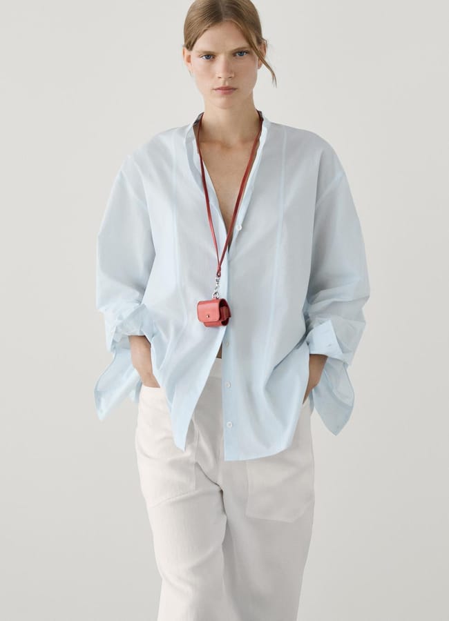 model on runway wearing Poplin shirt with stand-up collar