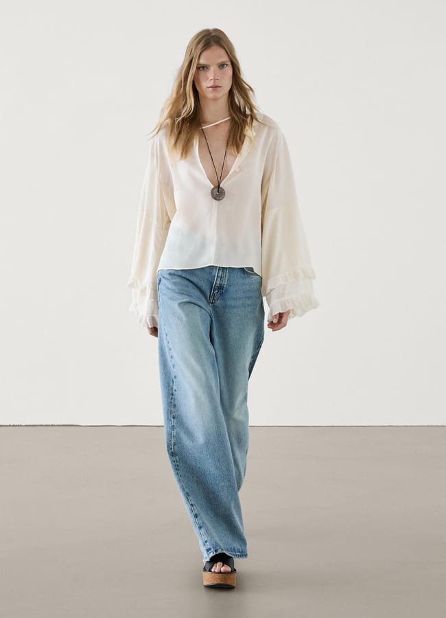 model on runway wearing Shirt with ruffled sleeves
