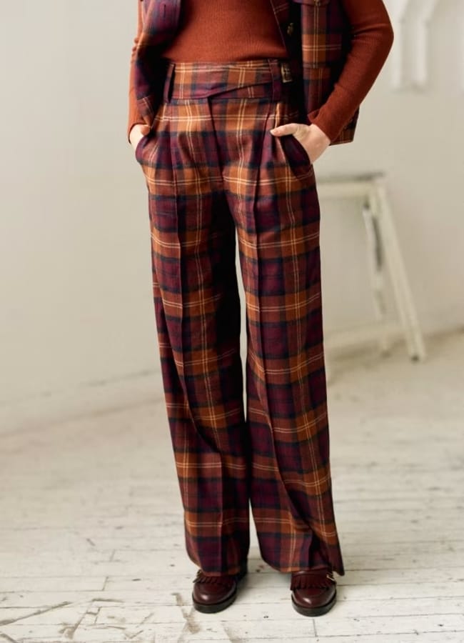 close up of legs wearing check pants