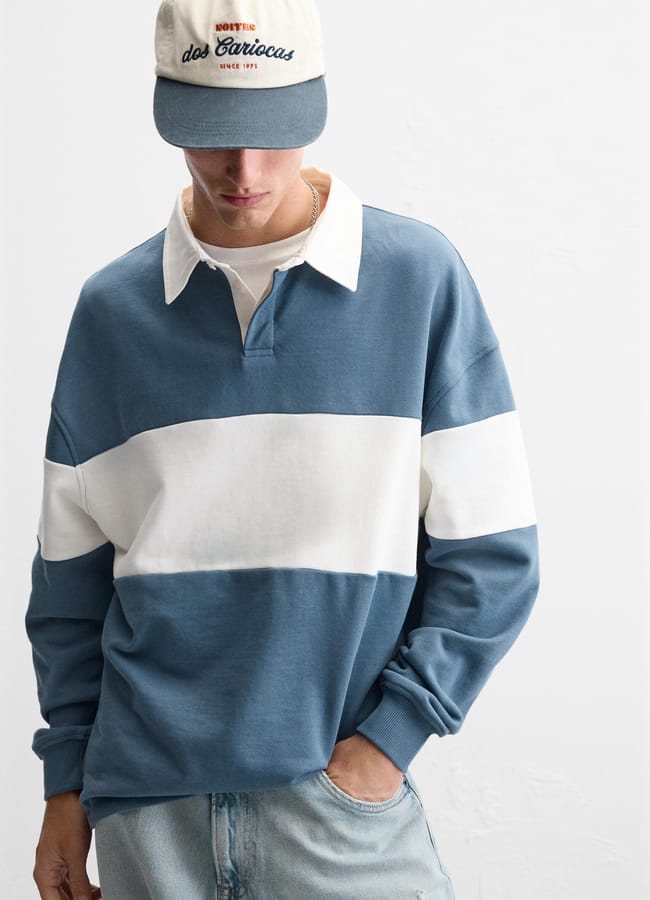 male model in blue ZARA COLOUR BLOCK POLO SHIRT