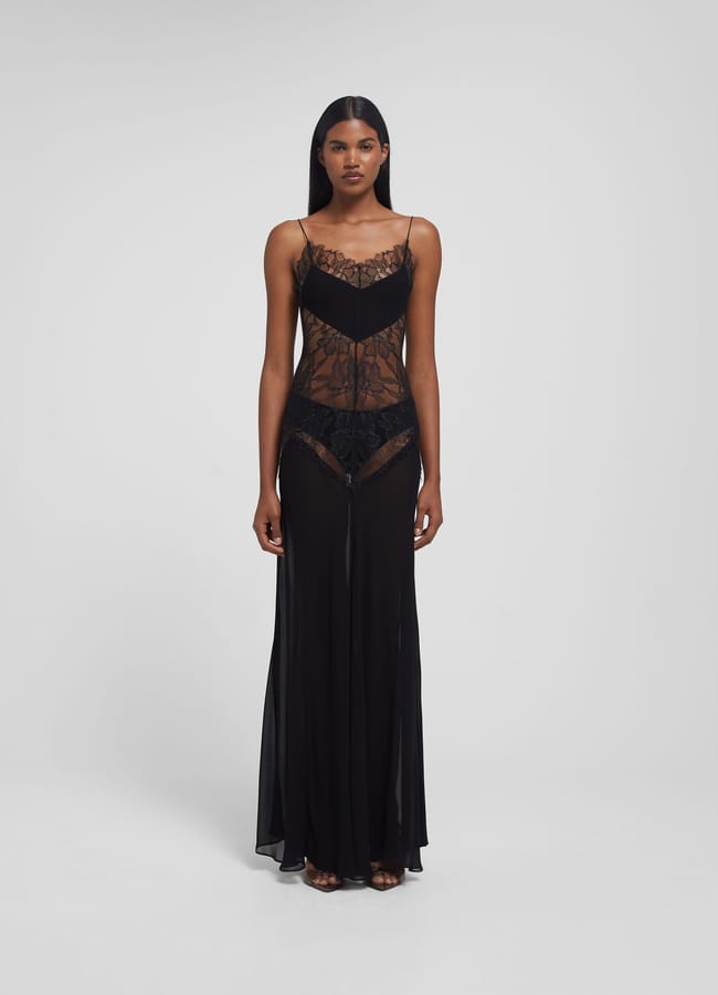 model wearing black pirella dress