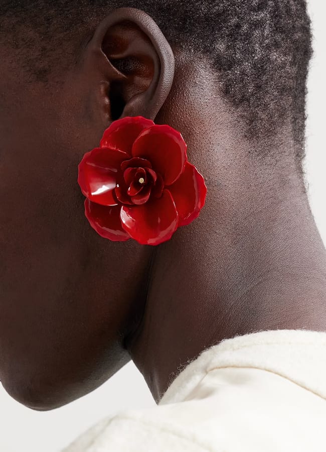 model close up wearing JENNIFER BEHR red flower earring