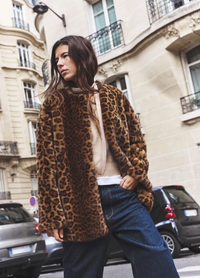 model in street wearing leopard print coat