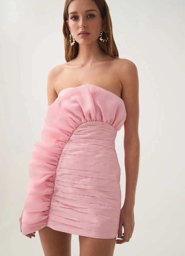 model wearing AJE Telma Ruffle Micro Mini Dress