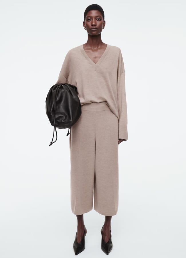 model wearing COS MERINO WOOL CULOTTES AND JUMPER