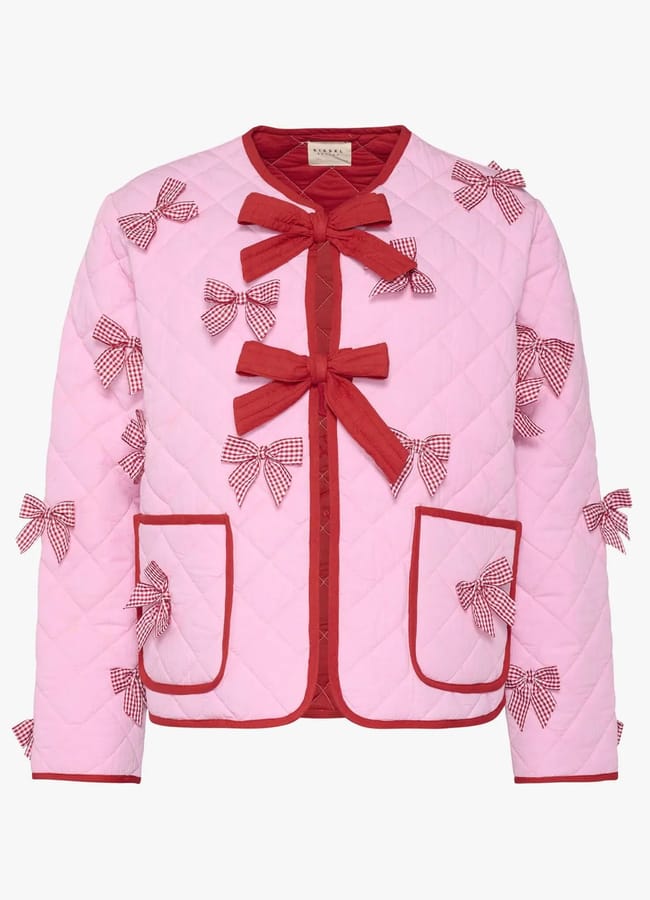 pink quilted jacket with bows