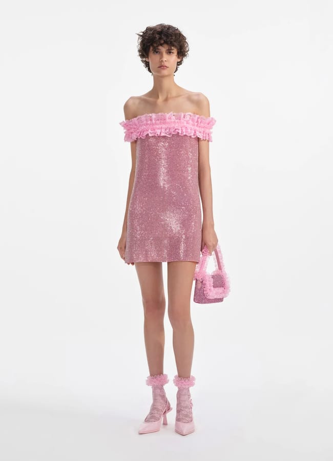 model wearing SELF-PORTRAIT Pink Crystal Fishnet Mini Dress