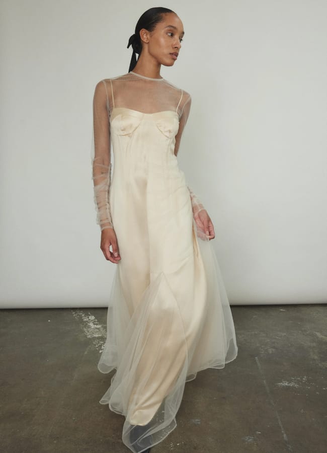 model wearing Violette Tulle Sheath Ivory wedding dress