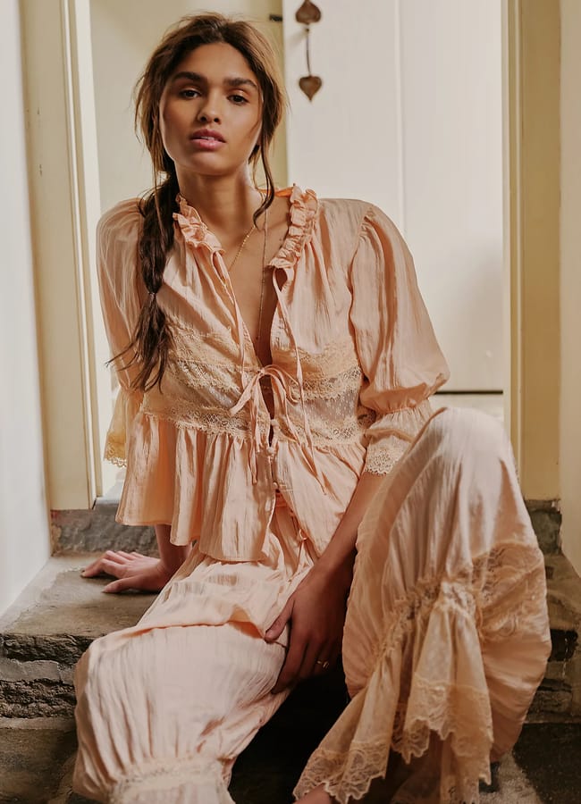 model wearing bloomer pants and top in pink