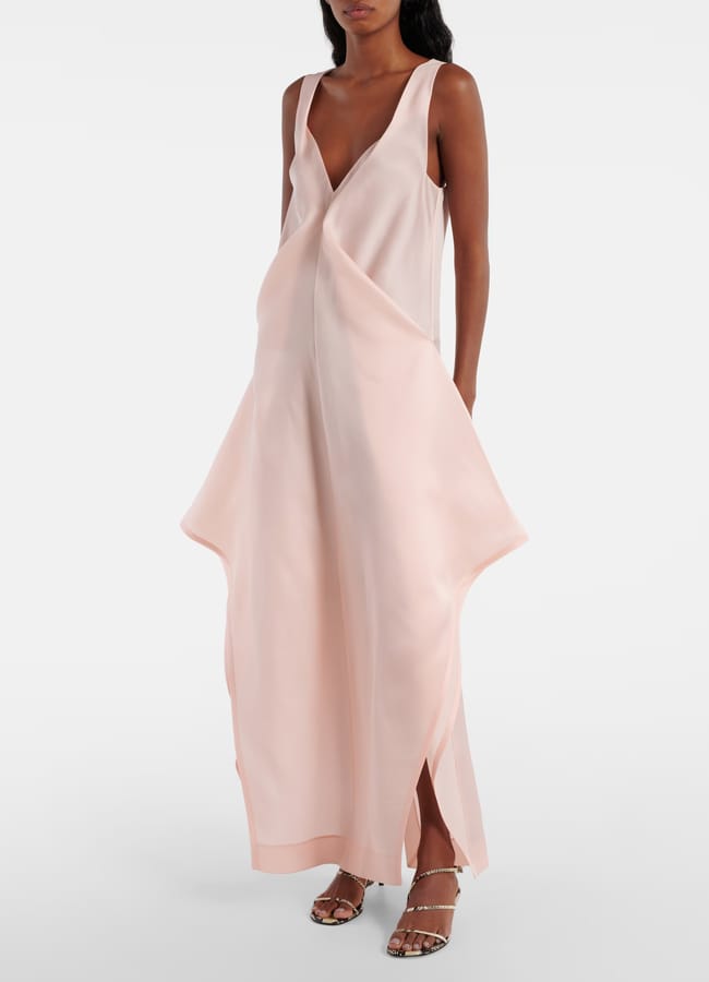 model wearing MYT Khaite Kenith silk maxi dress