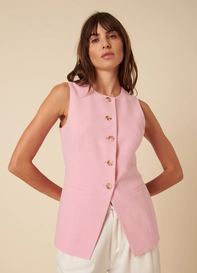 model wearing NOBODY'S CHILD Pink Long Line Crew Neck Waistcoat