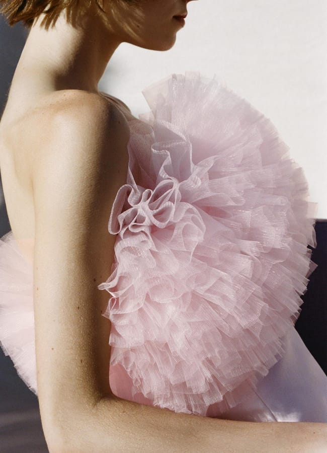 close up of model from side wearing pink ZARA SHORT TULLE VOLUME DRESS