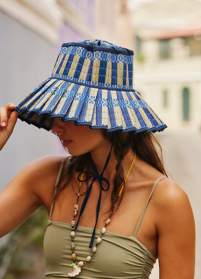 model wearing Island Capri Hat in blue
