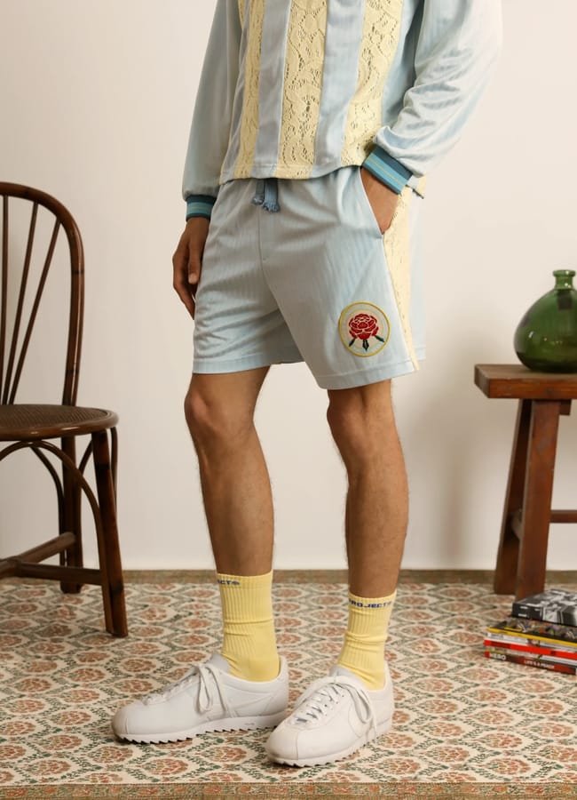 close up of Lace Football Short Baby Blue on male model