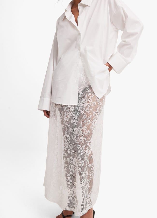 model wearing NA_KD Lace Maxi Skirt