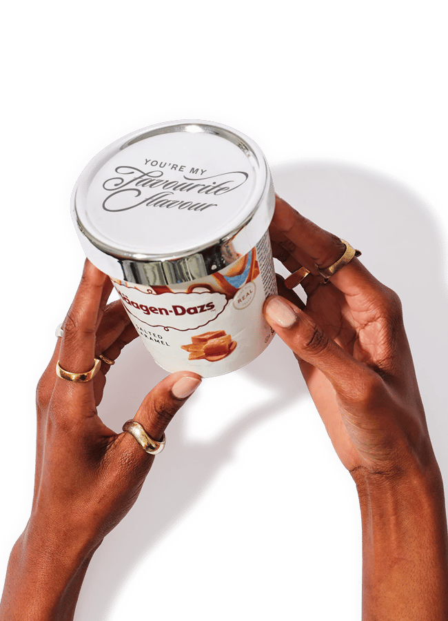 hands holding Silver Ice Cream Lid