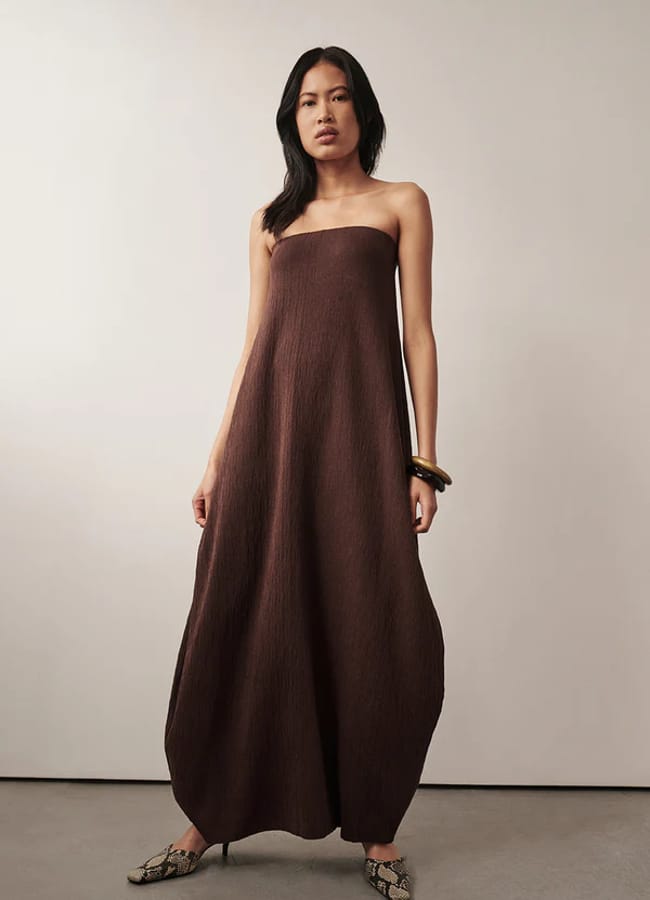 model wearing ALIAS CHOC TEXTURED KNIT STRAPLESS MIDI DRESS