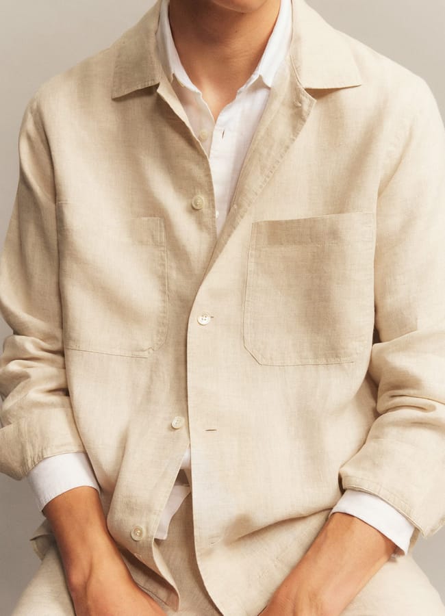 close up of model wearing Arket Relaxed Linen Shirt