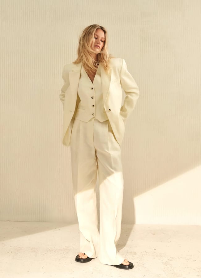 model wearing linen suit