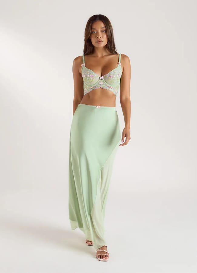model wearing green Elyssia Longline Bra & Skirt