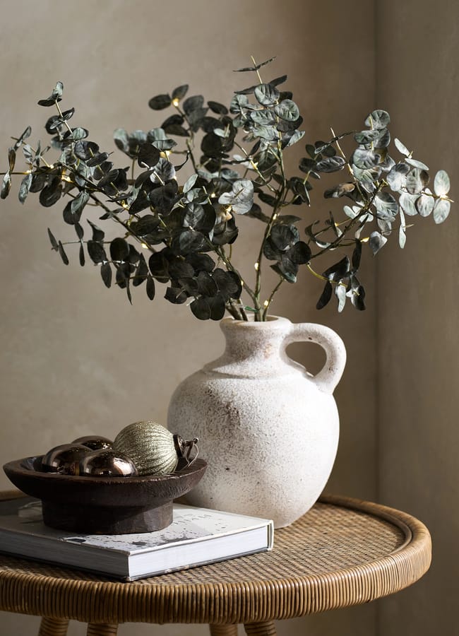 Eucalyptus Branches in white vase