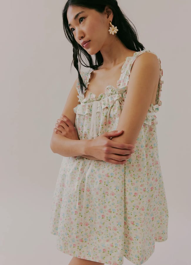 model wearing fp For Love & Lemons Summer Breeze Mini Dress