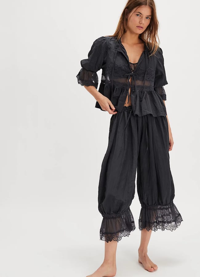 model wearing black FP Forever Young Bloomer Pants