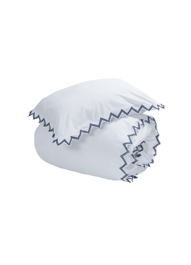 freida duvet cover in white with blue trim