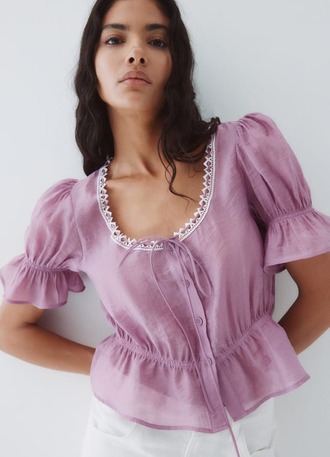 model wearing lilac H&M Short-sleeved peplum blouse