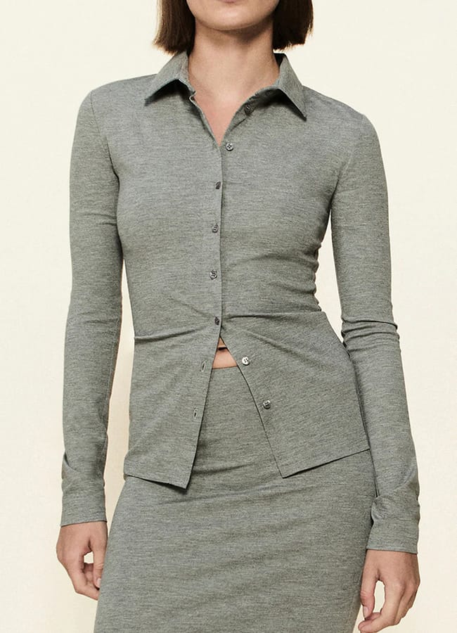 model wearing grey top