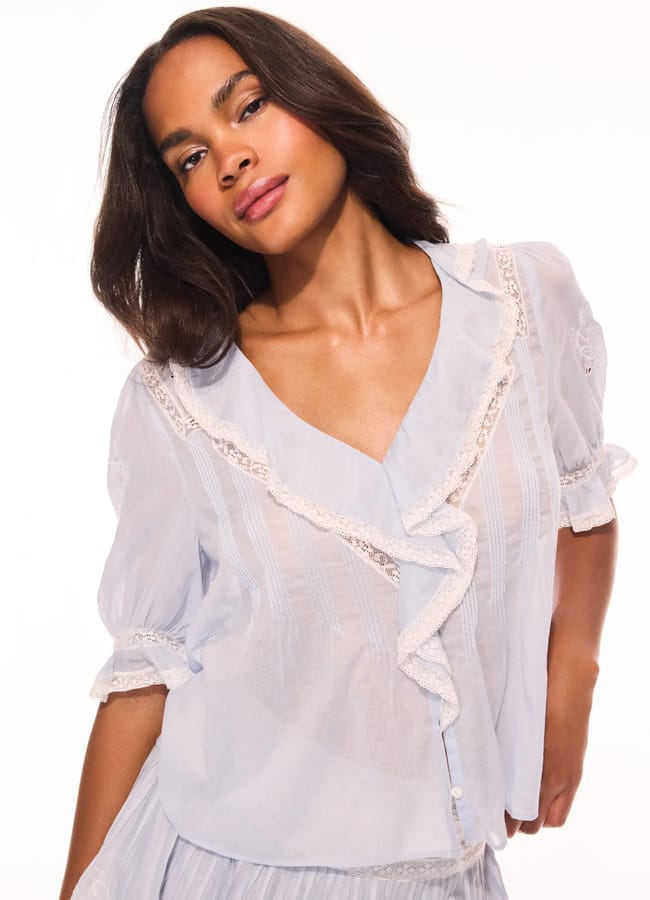 model wearing pale blue Sinora Embroidered Cotton Top