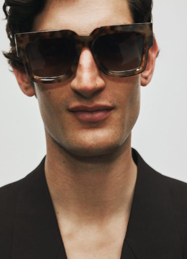 headshot of male model wearing sunglasses