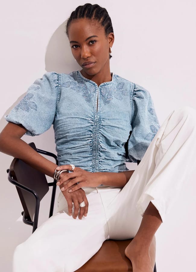 model sitting wearing Indigo Denim Embroidered Top