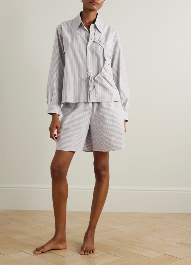 model wearing DEIJI STUDIOS Arch tie-detailed paneled striped organic cotton-poplin shirt and shorts