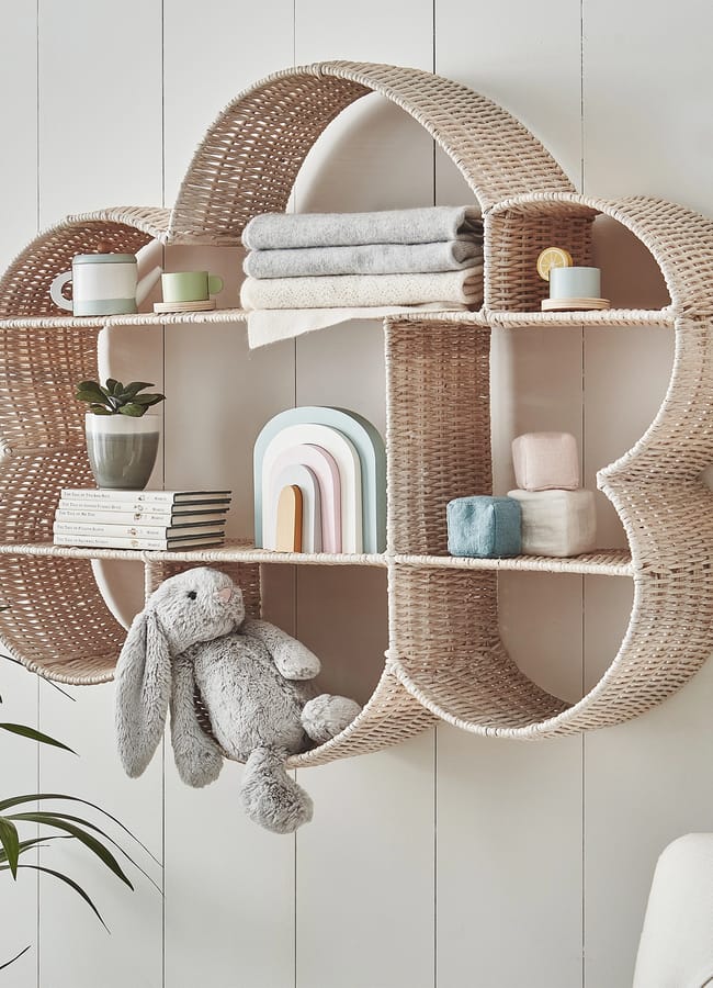 Rattan Cloud Bookshelf on wall with toys