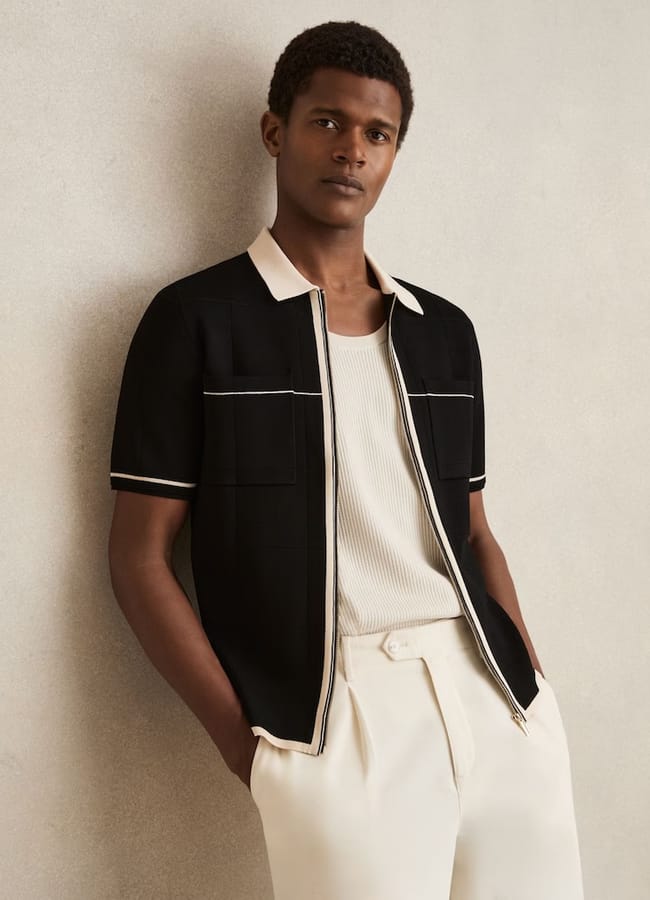 male model wearing Compact-Knit Tipped Zip-Through Shirt in Black/Stone