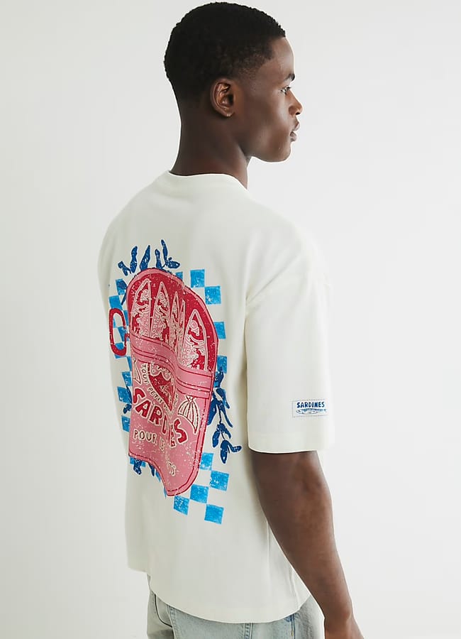 male model wearing River Island Beige Boxy Fit Sardine T-Shirt