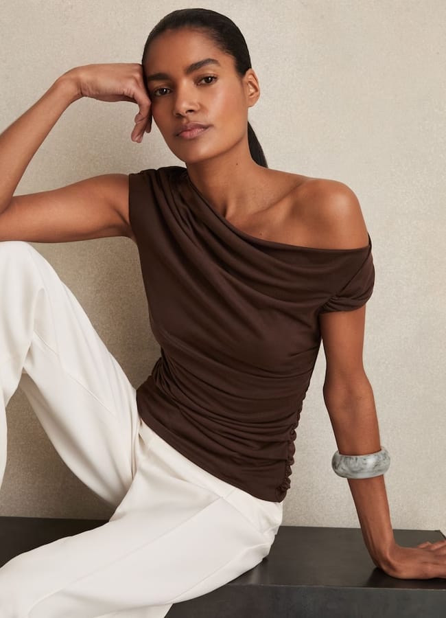 model wearing Serena Modal-Blend Ruched Off-Shoulder Top in Chocolate Brown