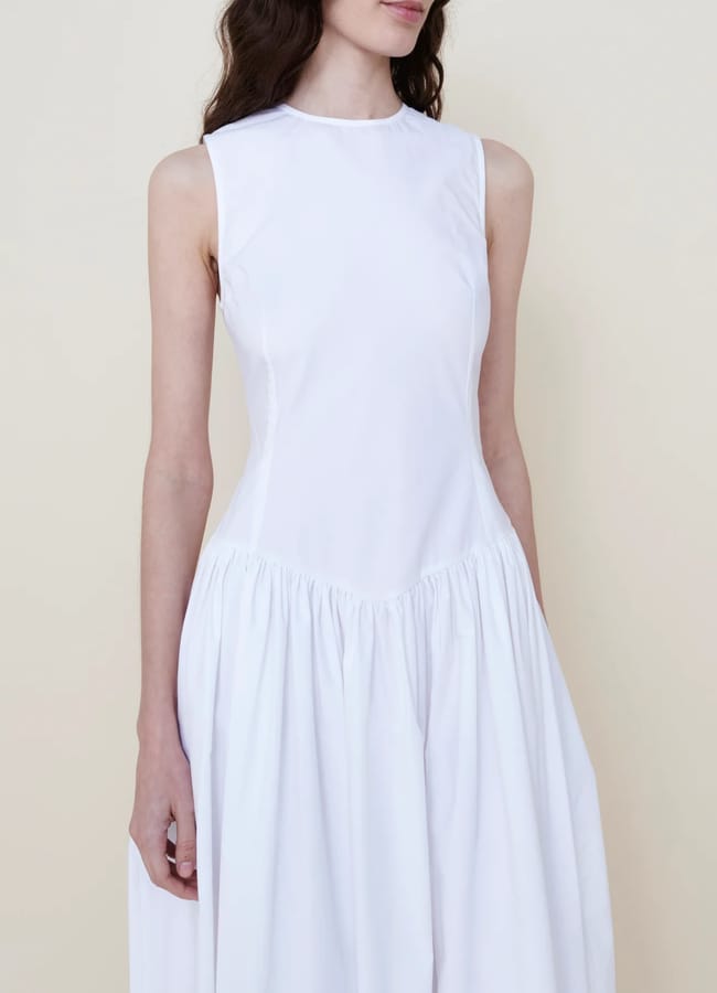 model wearing white The Kate Dress