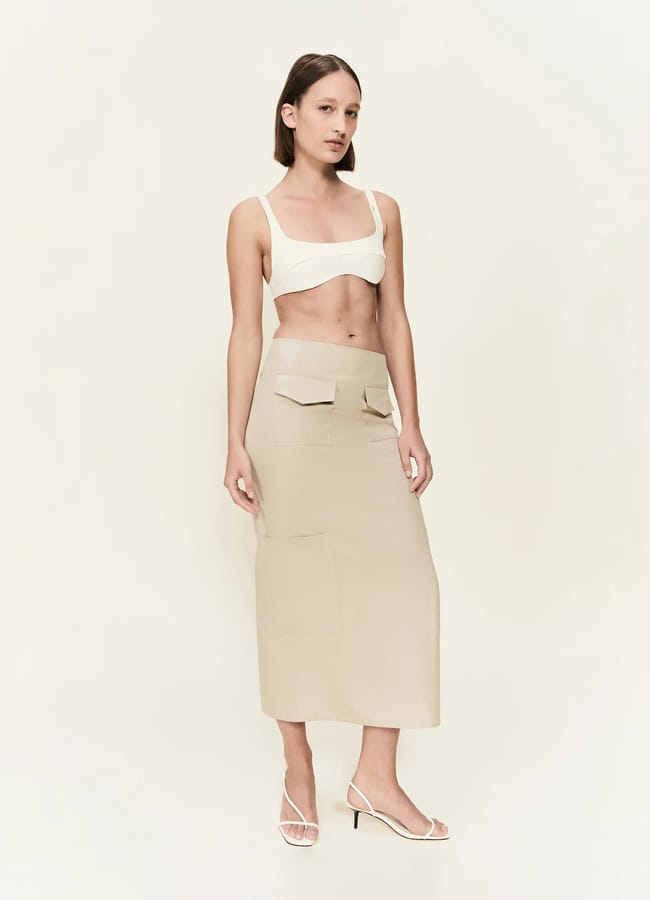 model wearing crop bra top and The Valletta Skirt