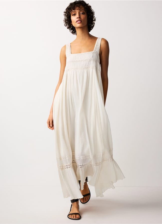 model wearing TWC Lace Insert Maxi Dress