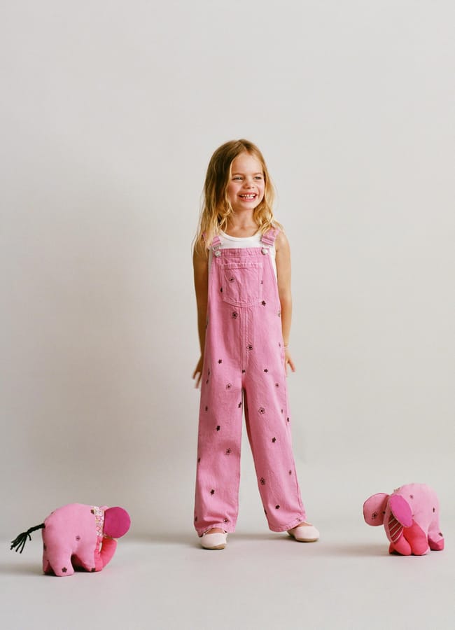 little girl wearing TWILL DUNGAREES WITH EMBROIDERED FLOWERS