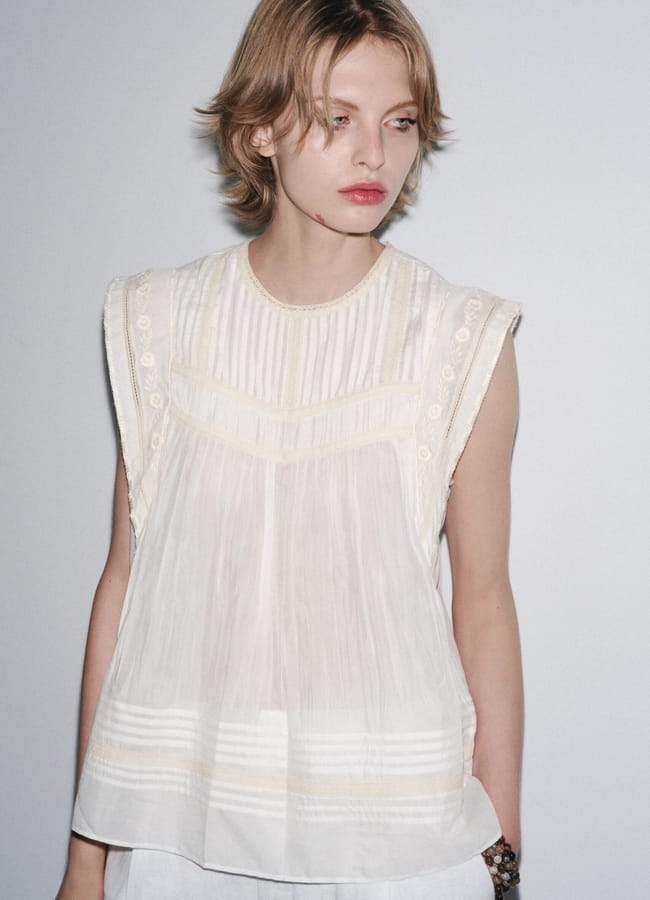model wearing white zara ZW COLLECTION EMBROIDERED BLOUSE