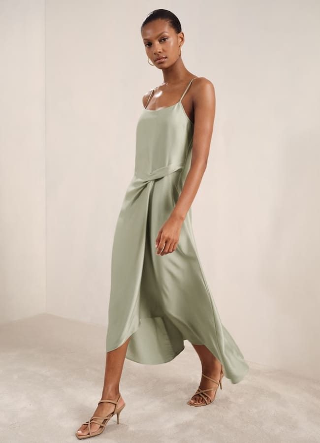 model wears Zoey Satin Drape-Detail Slip Dress in Sage