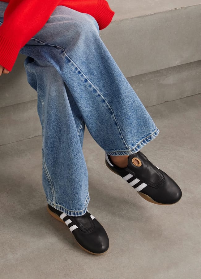 model's legs wearing ADIDAS ORIGINALS Taekwondo Mei leather sneakers