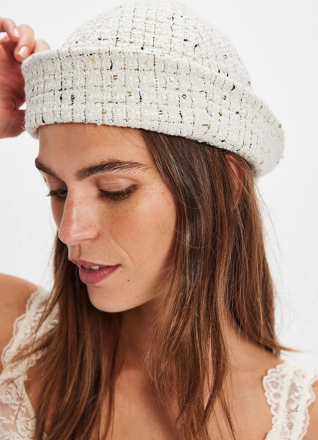 model wearing white Emmi Sailor Hat