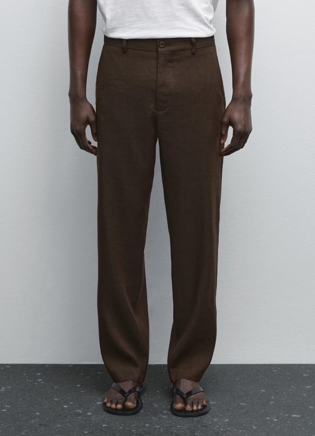 close up of male model wearing brown trousers