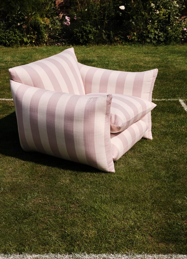 pink stripe outdoor chair on lawn